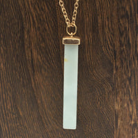 White Stone and Gold Necklace